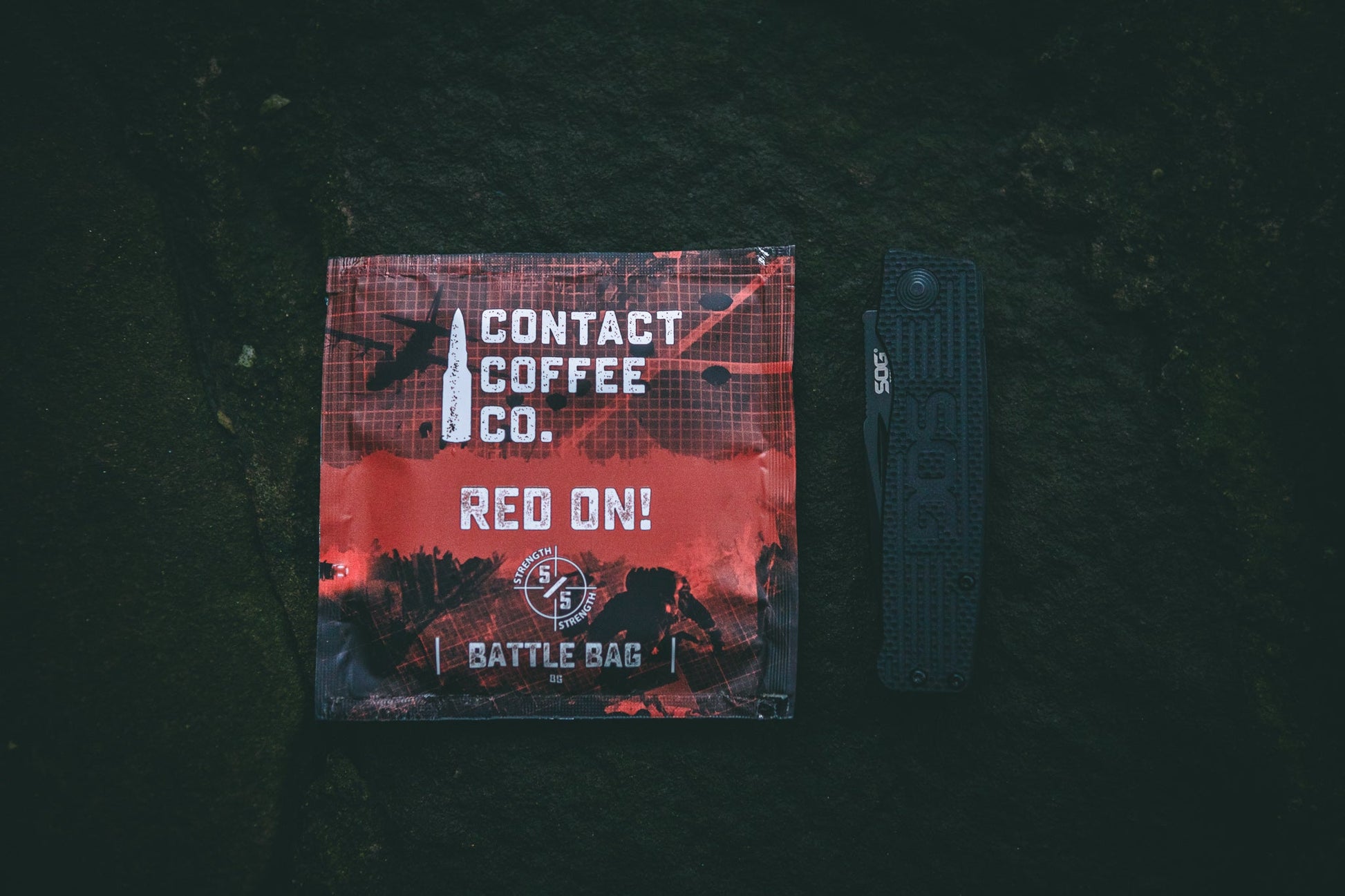 Red Single Serve Coffee Bag from Contact Coffee Company Ltd., ready for brewing, with vibrant packaging and coffee grounds visible.