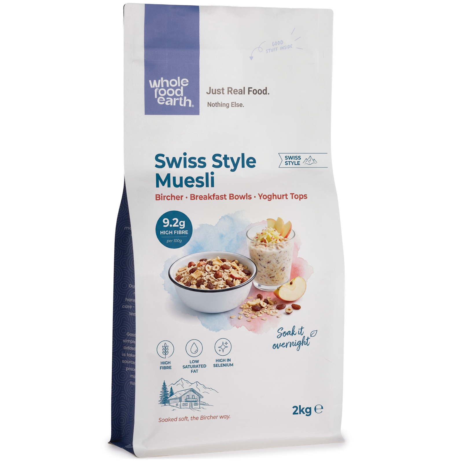 Whole Food Earth Swiss Style Muesli cereal with flakes, dried fruit, and nuts in a bowl on a wooden table.