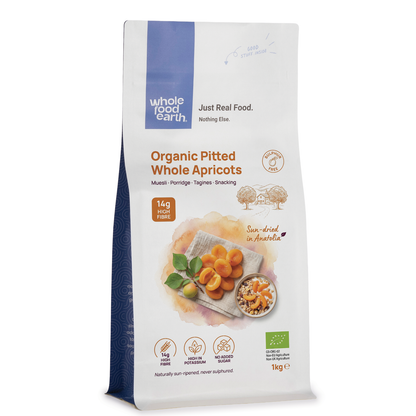 Dried organic pitted whole apricots from Whole Food Earth, showing vibrant orange dried apricots ready for snacking or baking.