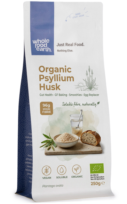 Organic Psyllium Husk by Whole Food Earth, close-up of brown, textured psyllium husk in a clear bowl for dietary fiber.