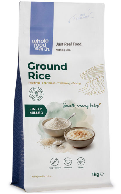 Whole Food Earth ground rice in a clear bowl, showcasing fine, white rice flour suitable for baking and cooking.