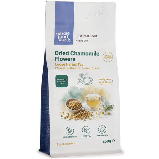 Dried chamomile flowers from Whole Food Earth, loose herbal tea herbs with yellow petals and green stems, for herbal infusion.