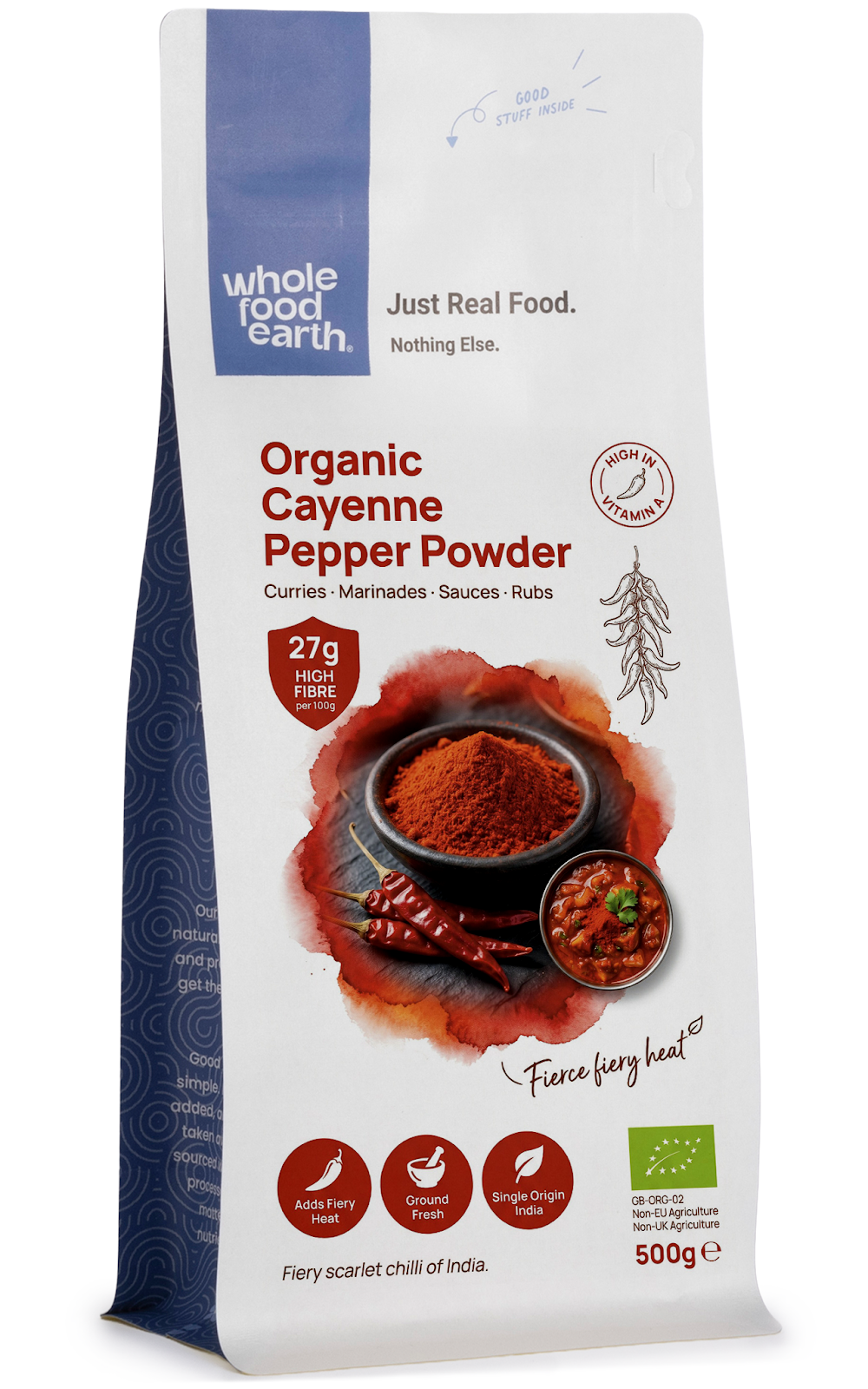 Organic cayenne pepper powder from Whole Food Earth, vibrant red spice in a clear jar, highlighting its fine, powdered texture.