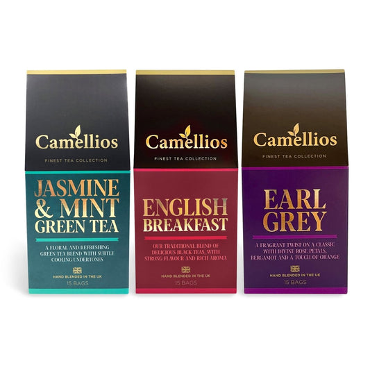 Assorted Camellios Classic Tea Bundle with various tea and infusion packages arranged on a wooden surface.