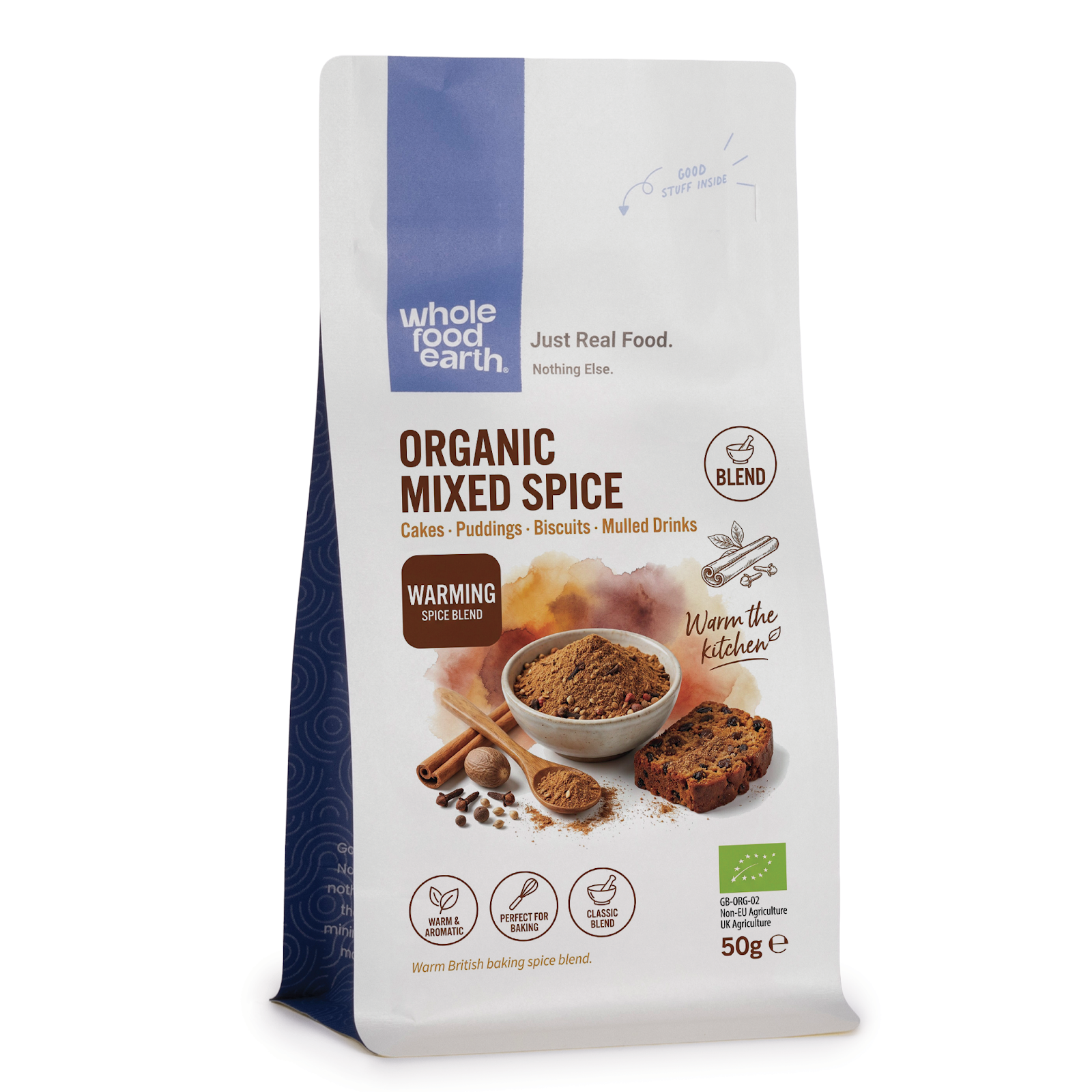 Whole Food Earth organic mixed spice in a glass jar, showcasing a colorful blend of herbs and spices on a white background.