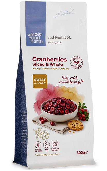 Whole Food Earth dried cranberries, sliced and whole, showcasing vibrant red dried fruits for healthy snacking or baking.