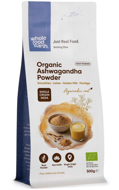 Organic Ashwagandha powder in a clear jar, herbal supplement from Whole Food Earth, showcasing the earthy, fine powdered herb inside.