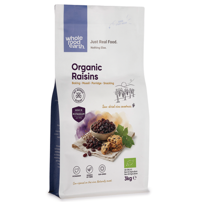 Organic raisins from Whole Food Earth, dried fruit, showing a close-up of plump, juicy raisins in a clear container.