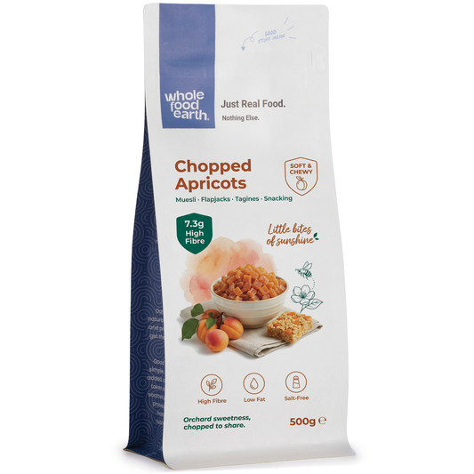 Dried chopped apricots from Whole Food Earth, a natural fruit snack with vibrant orange, sliced pieces in a clear container.