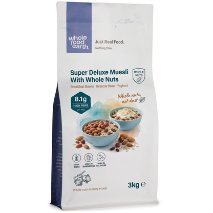 Whole Food Earth Super Deluxe Muesli cereal with whole nuts, dried fruit, seeds, and flakes in a natural breakfast bowl.
