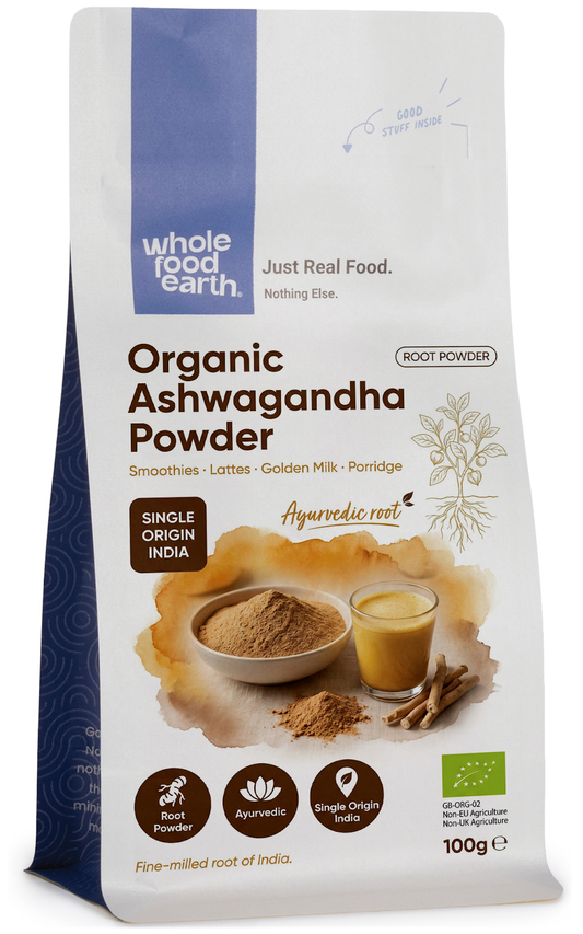 Organic Ashwagandha powder in a glass jar, labeled as Whole Food Earth herbs and spices for natural health.