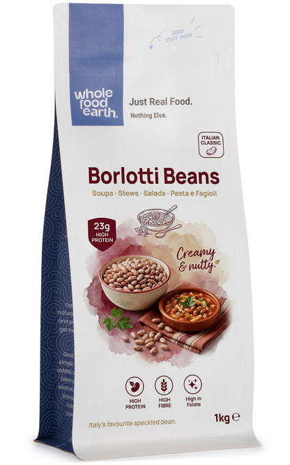 Borlotti beans from Whole Food Earth, organic beans and pulses in a clear bowl, showcasing their reddish-brown and cream speckled appearance.