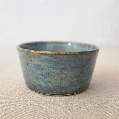 Seafoam blue ceramic breakfast bowl with white interior, featuring a classic design by Katie L Thompson Designs.