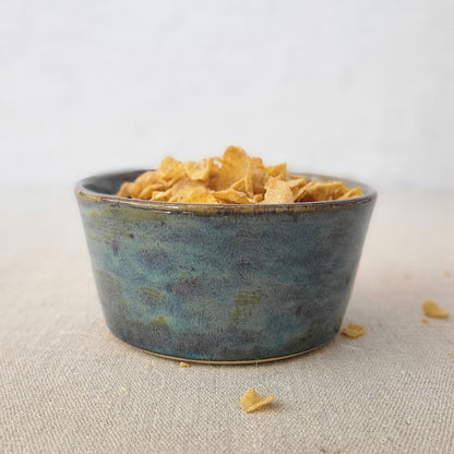 Seafoam blue breakfast bowl by Katie L Thompson Designs with a smooth, rounded ceramic design and a glossy finish.