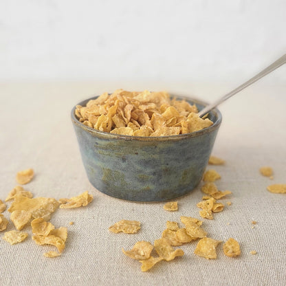 Seafoam blue ceramic breakfast bowl with a classic design by Katie L Thompson Designs, shown on a neutral background.