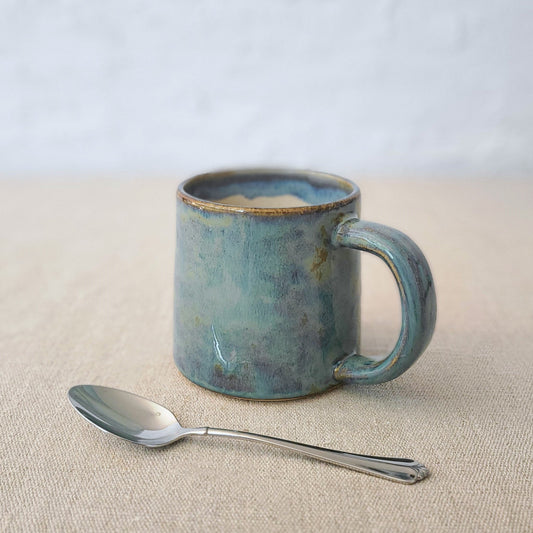Seafoam blue classic standard mug by Katie L Thompson Designs, featuring a smooth ceramic surface and ergonomic handle.