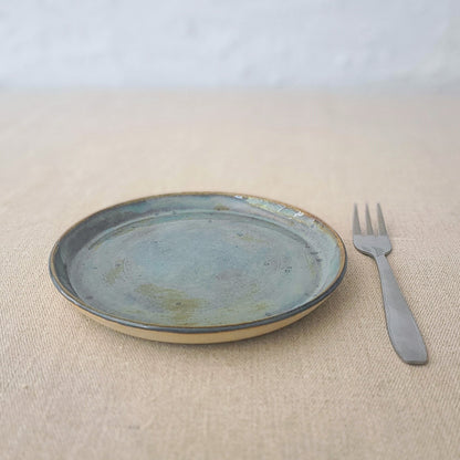 Seafoam blue classic cake plate by Katie L Thompson Designs, featuring a smooth round surface and elegant design.