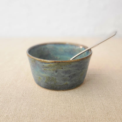 Seafoam blue ceramic breakfast bowl by Katie L Thompson Designs, featuring a smooth glossy finish and classic round shape.
