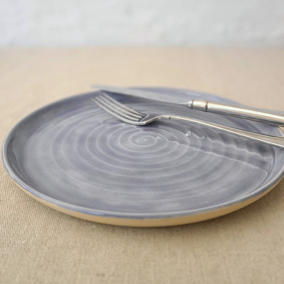 Amethyst purple classic lunch plate by Katie L Thompson Designs with a smooth ceramic surface and rounded edges.