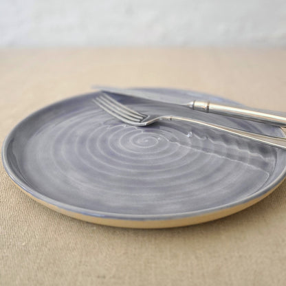 Amethyst purple classic lunch plate by Katie L Thompson Designs with a smooth ceramic surface and rounded edges.