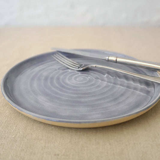 Amethyst purple classic lunch plate by Katie L Thompson Designs with a smooth ceramic surface and rounded edges.