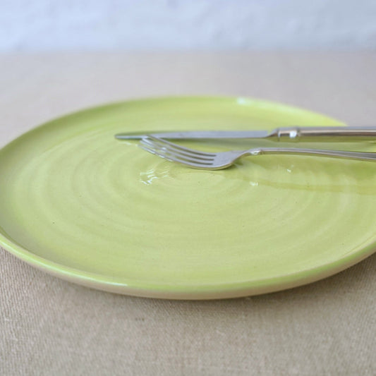 Spring green classic dinner plate by Katie L Thompson Designs, featuring a smooth round shape and vibrant green color.