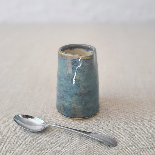 Seafoam blue mini ceramic jug by Katie L Thompson Designs, featuring a classic small jug with a smooth finish and elegant shape.