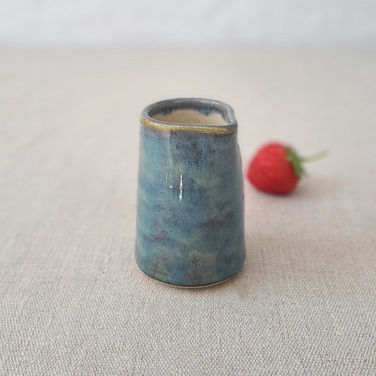 Seafoam blue mini jug by Katie L Thompson Designs, featuring a smooth ceramic surface and a small, rounded handle.
