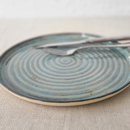 Seafoam blue ceramic dinner plate by Katie L Thompson Designs, classic round design with a smooth glossy finish.
