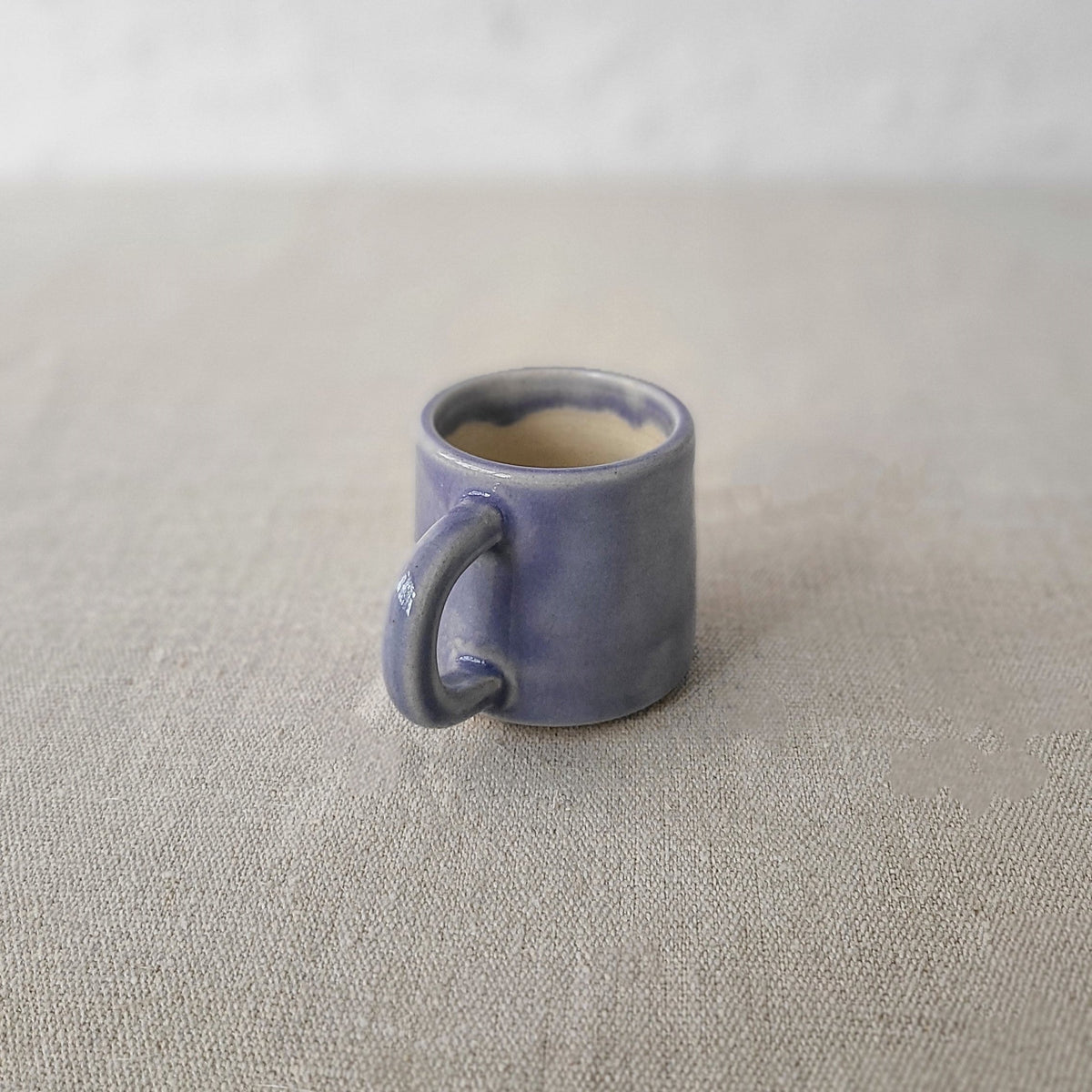 Amethyst purple ceramic espresso mug by Katie L Thompson Designs, featuring a classic shape and smooth finish.