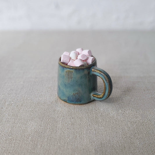 Seafoam blue ceramic espresso mug by Katie L Thompson Designs with a smooth finish and classic shape.
