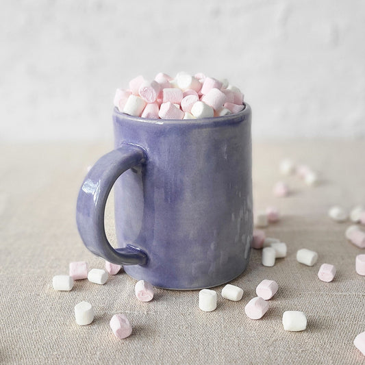 Amethyst purple classic pint mug with Katie L Thompson Designs branding, showcasing a smooth ceramic surface and handle.