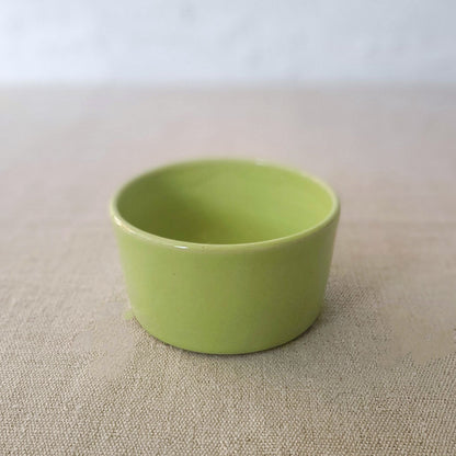 Spring green classic side bowl by Katie L Thompson Designs featuring a smooth, rounded ceramic design for serving small dishes.