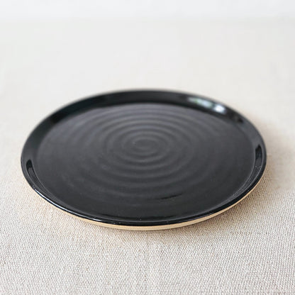Jet black classic side plate by Katie L Thompson Designs, round ceramic plate with a smooth finish and simple elegant design.
