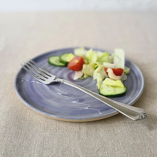 Amethyst purple ceramic side plate by Katie L Thompson Designs, featuring a classic round shape and elegant design.