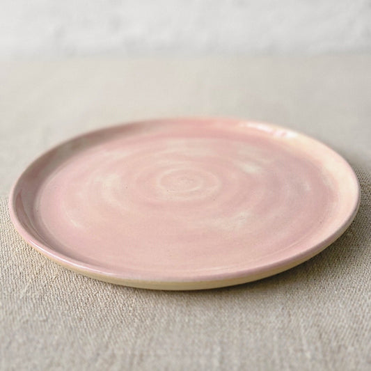 Blush pink classic side plate by Katie L Thompson Designs, featuring smooth ceramic surface and elegant rounded edges.