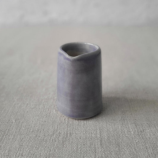 Amethyst purple mini jug by Katie L Thompson Designs, showcasing a small ceramic jug with a glossy purple glaze.