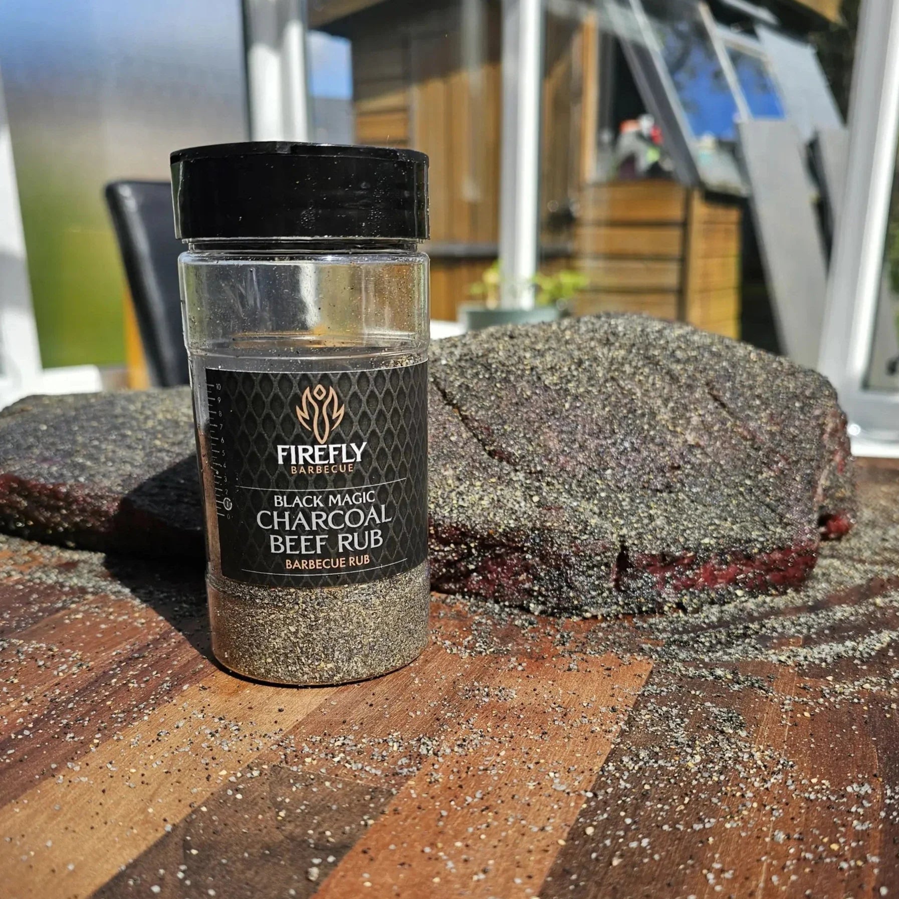 Black Magic Charcoal Beef Rub by FireFly Barbecue, a smoky BBQ rub with dark spice blend for grilled beef dishes.