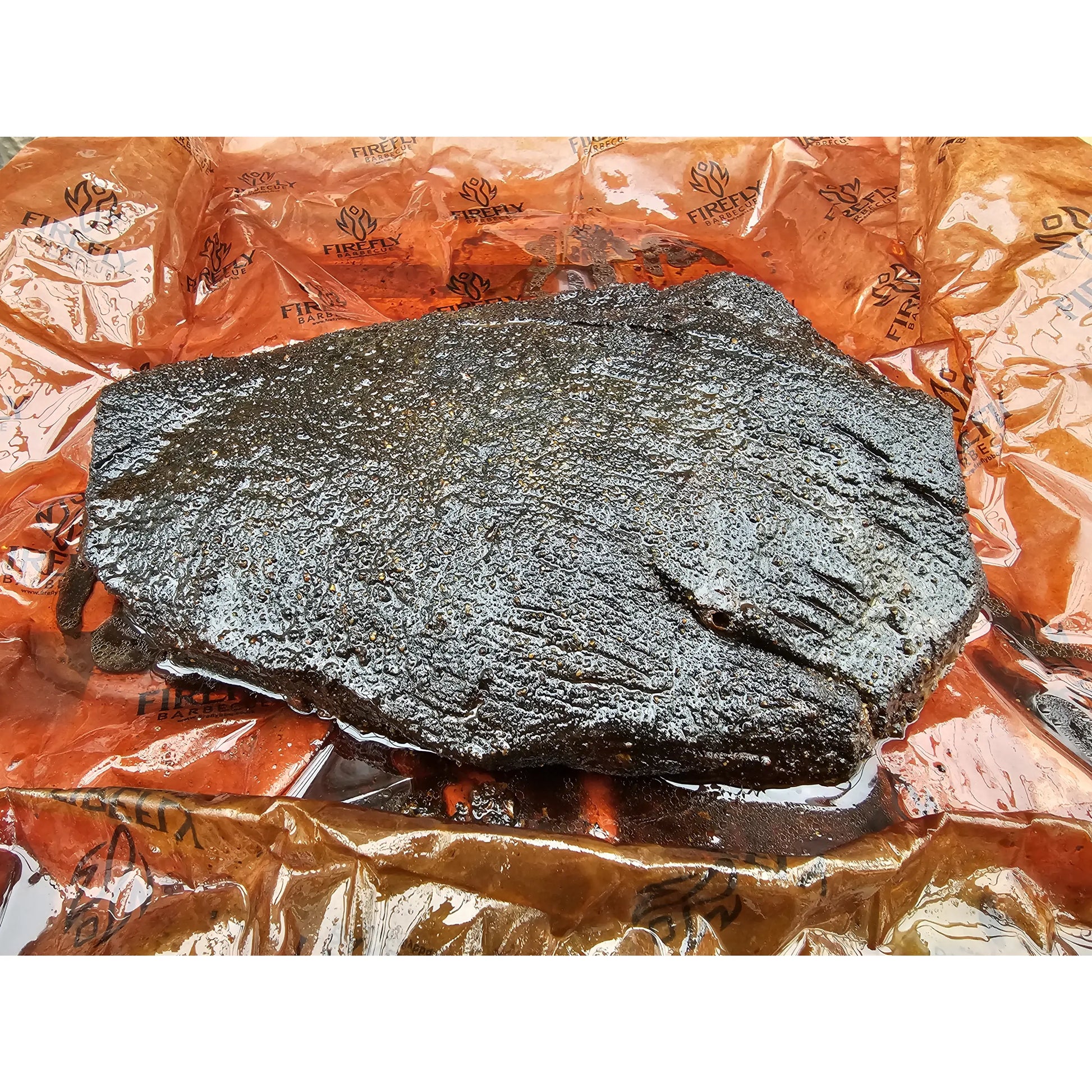 FireFly Barbecue Black Magic Charcoal Beef Rub in a jar, featuring dark spices for flavorful BBQ beef.