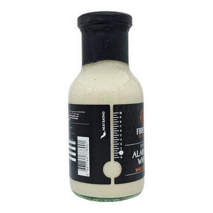 Bottle of FireFly Barbecue Alabama White BBQ Sauce with label and sauce visible in a clear glass bottle.