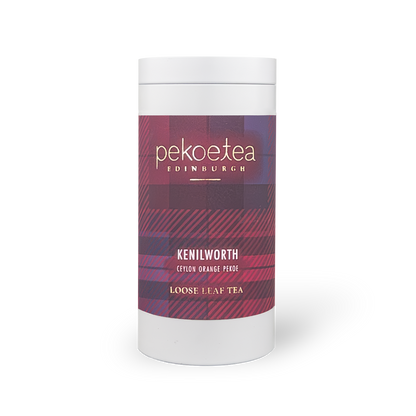 Kenilworth Ceylon Orange Pekoe tea in a decorative PekoeTea Edinburgh caddy with orange and gold accents.