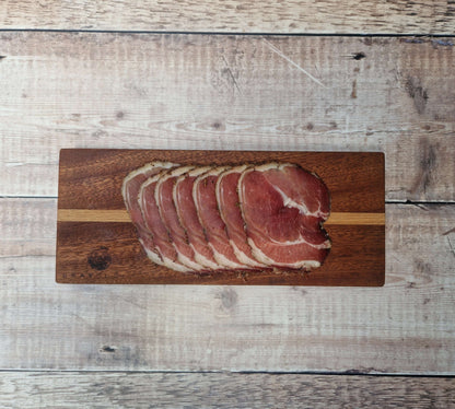 Air-dried ham gift card from Bray Cured for charcuterie experiences, featuring a boxed presentation and a sleek design.