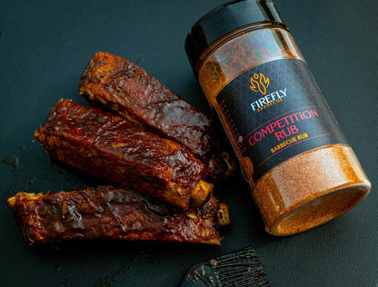 FireFly Barbecue Competition BBQ Rub jar with a label, showcasing a flavorful spice blend for grilling and smoking meats.
