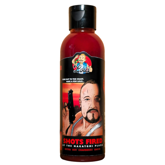 Bottle of Shots Fired! At The Nagatomi Plaza hot sauce from Lou's Brews, showcasing fiery label and vibrant sauce color.