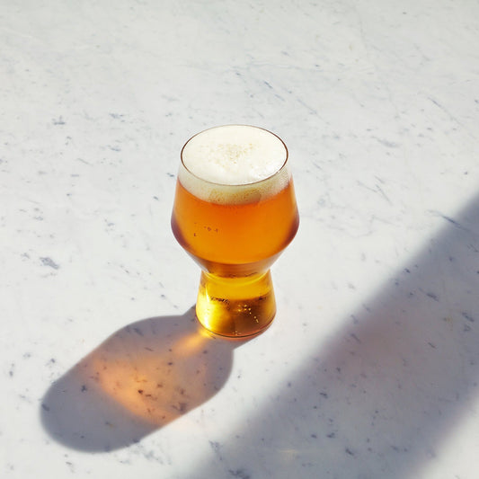 Set of two Aaron Probyn JUNIPER beer glasses with clear, elegant design for enjoying craft beers.
