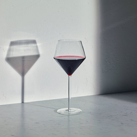 Set of two Aaron Probyn Juniper large red wine glasses with clear glass bowls and elegant stems.
