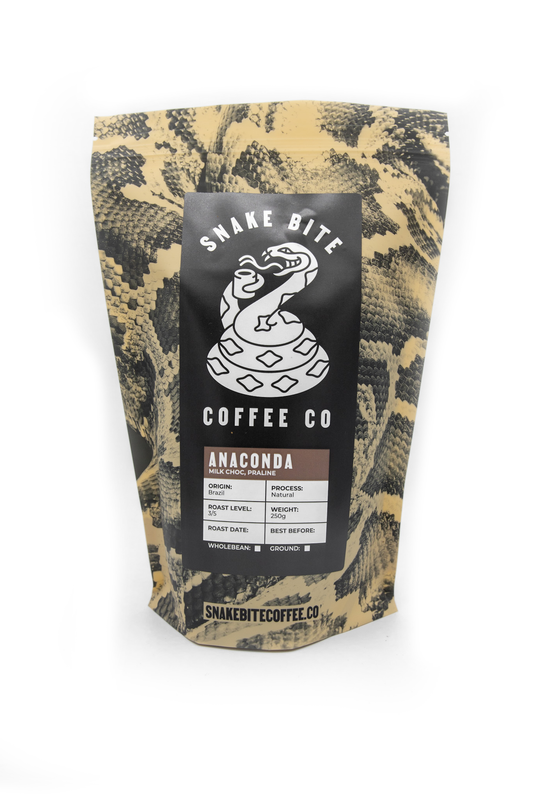 250g package of Anaconda Brazil coffee by Snake Bite Coffee, featuring a vibrant label with jungle and snake imagery.