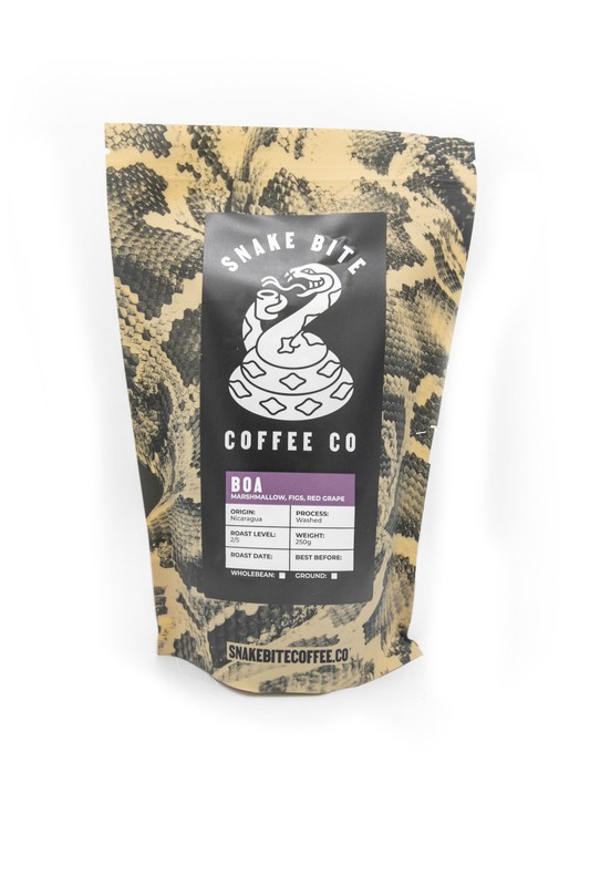 250g bag of Snake Bite Coffee Boa Nicaragua coffee beans, showcasing the packaging and fresh roasted beans.