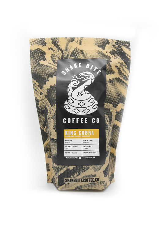 250g bag of King Cobra House Blend coffee by Snake Bite Coffee, featuring a dark roasted coffee beans bag.