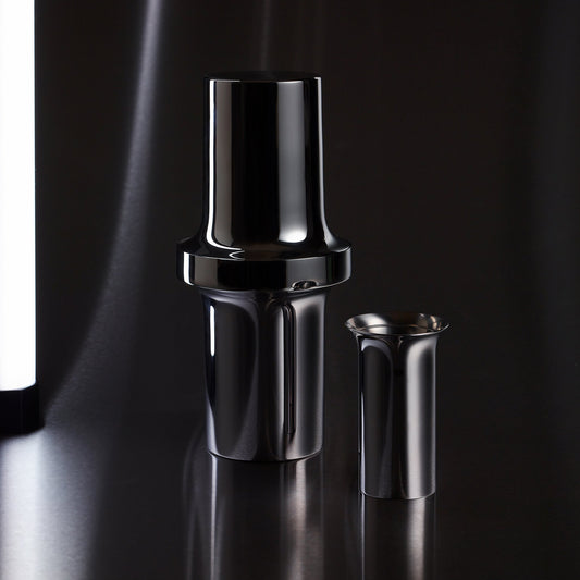 Aaron Probyn Barbican cocktail jigger with dual measuring sides, stainless steel design for precise bartending.